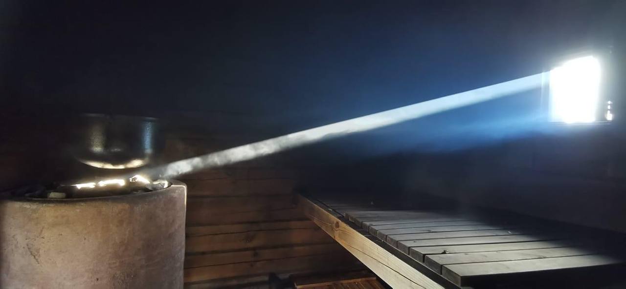 A beam of daylight crossing the steam inside a thermal room